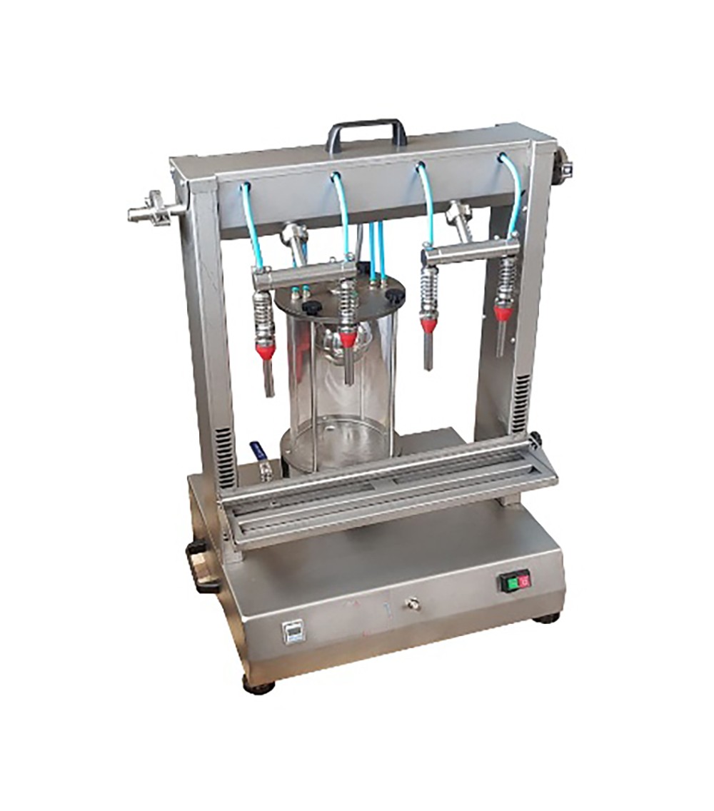 Riempitrice a depressione 500 lt/h Riempitrice a depressione 500 lt/h