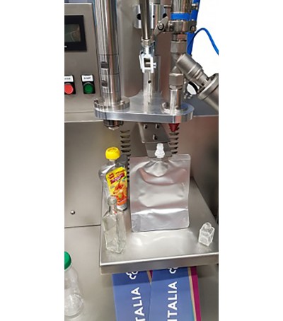 DOSATRICE AUTOMATICA per liquidi delicati, per riempimento contenitori rigidi