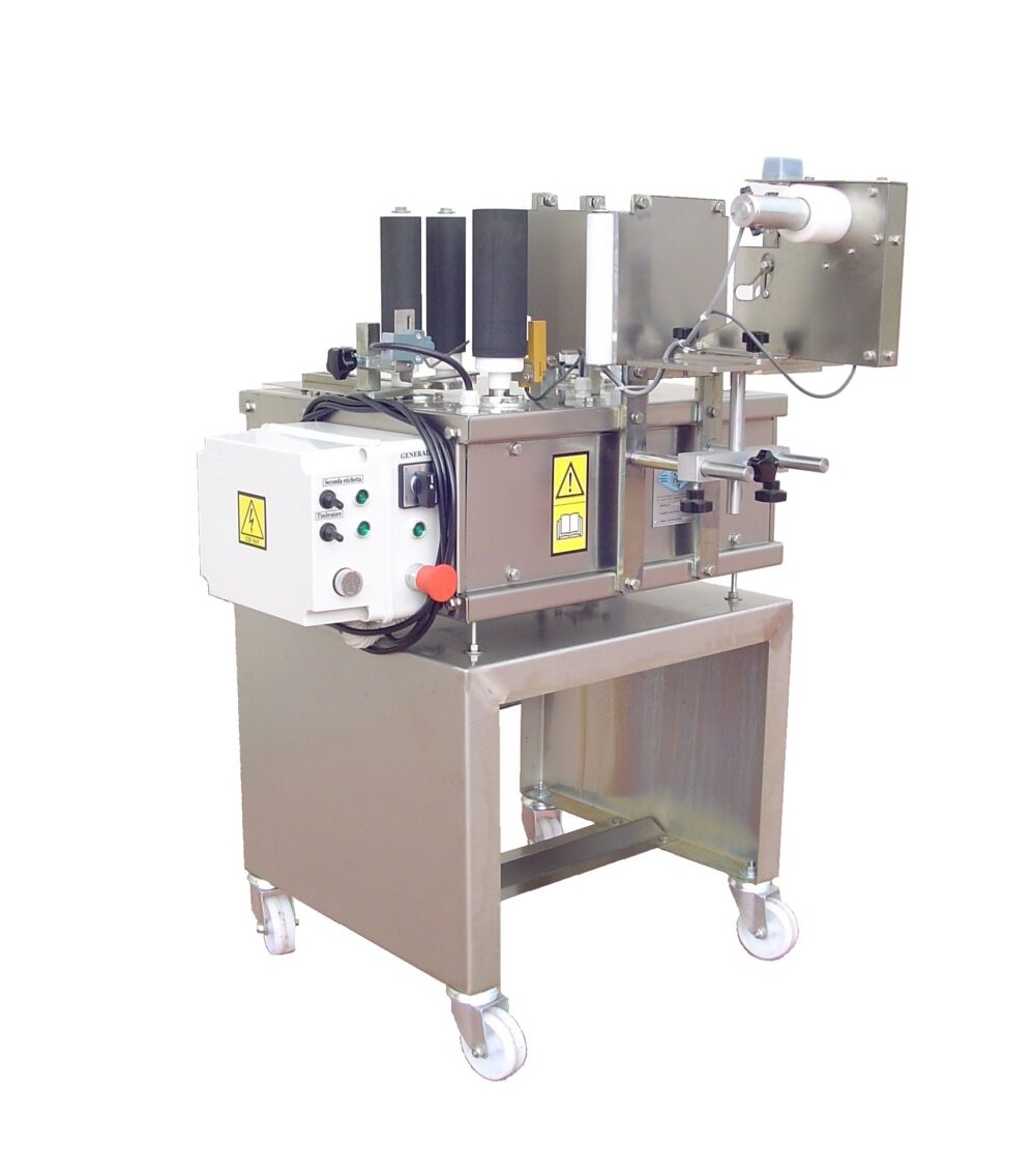 ETICHETTATRICE SEMIAUTOMATICA bottiglie tonde, carrello, stessa bobina ETICHETTATRICE SEMIAUTOMATICA bottiglie tonde, carrello, stessa bobina